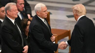 Photo of Trump, Pence shake hands at Carter funeral in first public meeting since leaving office