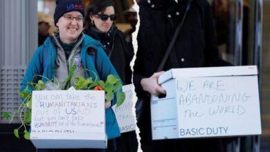 Photo of USAID workers send message to Trump on boxes while leaving office for last time